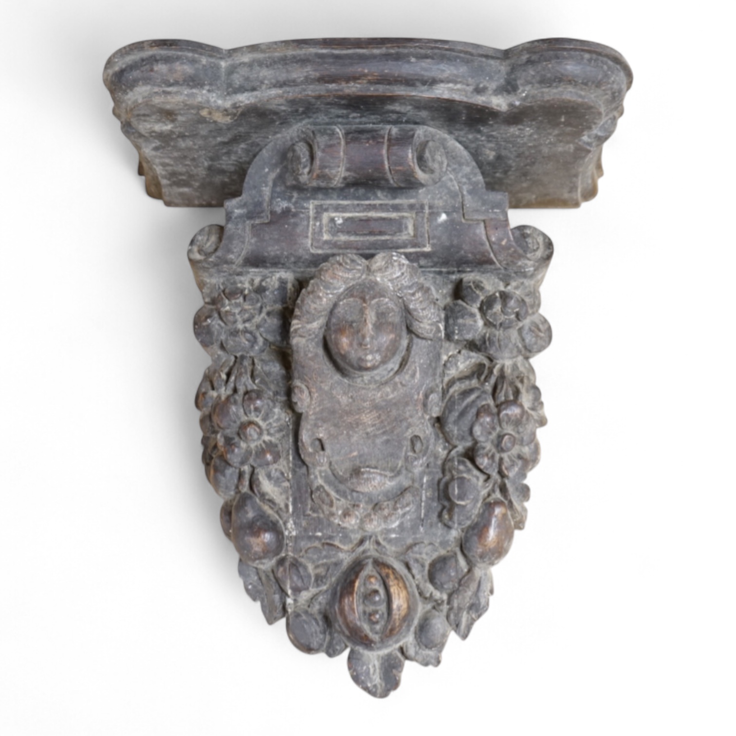 A Carved oak figural wall bracket, in late 17th century style, 35cm long